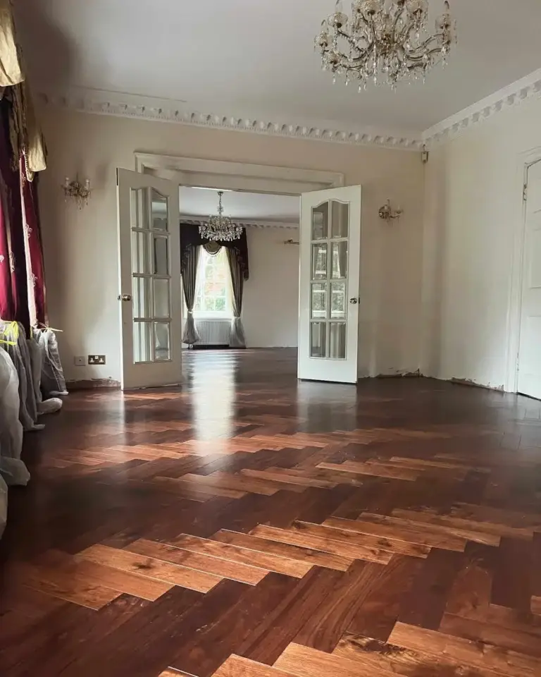 Herringbone wood flooring installation in luxury living room – London