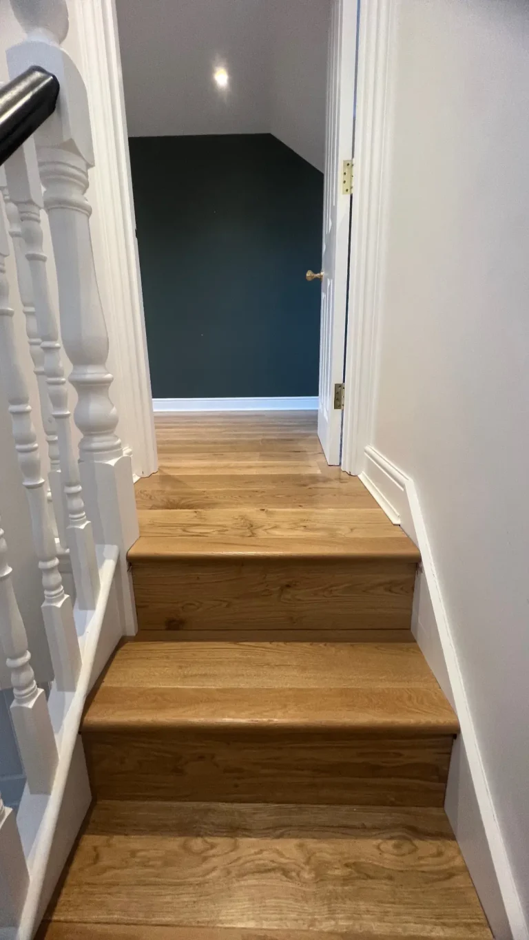 Oak stair and floor installation in North West London hallway